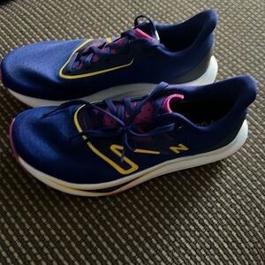New Balance Navy Blue Sneakers with Yellow and Pink Accents